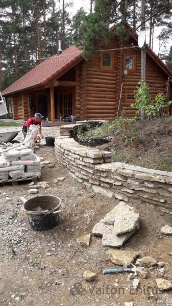 Забор из камня на даче